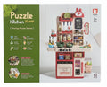 Puzzle kitchen set with 63 pieces, including toy utensils, pots, and food items, ideal for imaginative play.