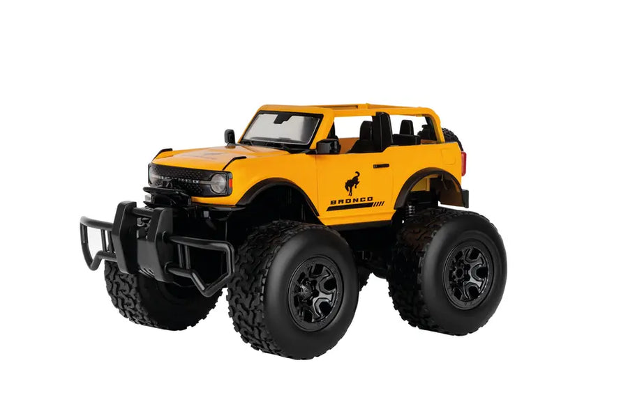 RC Ford Bronco 1:14 scale Carrera remote control car with detailed exterior and large tires, viewed from a side angle.