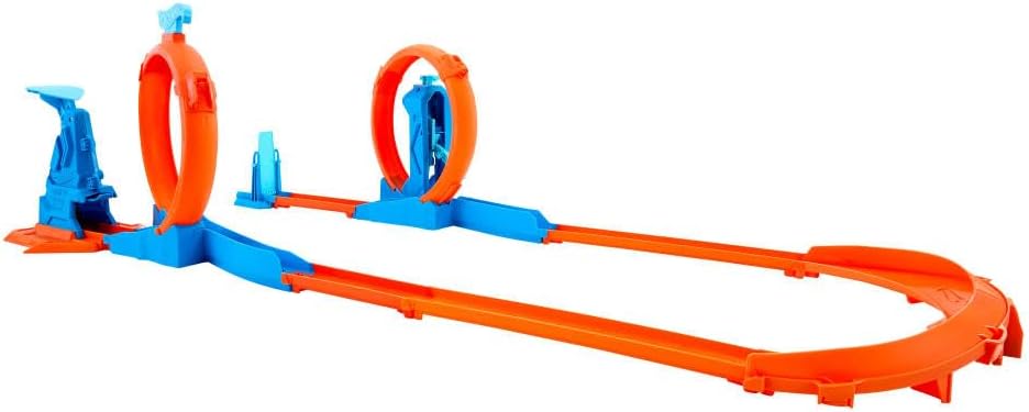 Hot Wheels toy car track set with triple loops and a 1:64 scale vehicle for kids and racing fun.