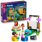 LEGO 42642 Friendship Movie Night set featuring LEGO minifigures and detailed movie-themed accessories on a colorful background.