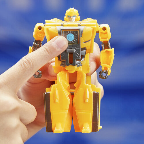 Hasbro Transformers One Cog Changer Bumblebee action figure in robot mode, showing yellow and black details with car parts.