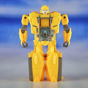 Hasbro Transformers One Cog Changer Bumblebee action figure in robot mode, featuring yellow and black detailing and automotive design.