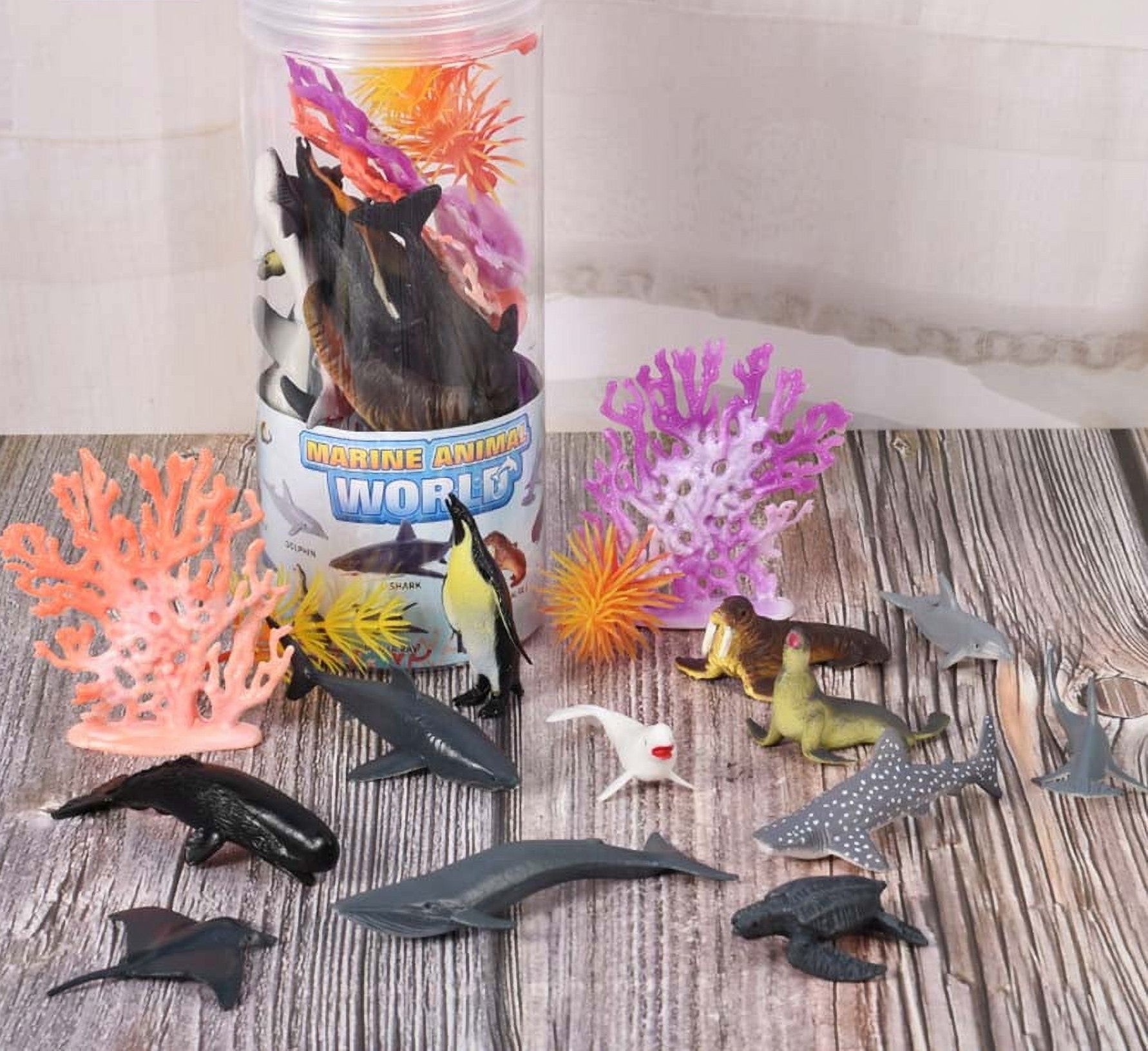 Colorful sea animal toys from the Animal World set, including various marine creatures in a bucket, made by Generic.