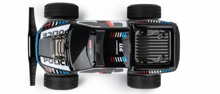 Carrera RC Ford F-150 Raptor Police toy car with 2.4 GHz remote control, detailed police vehicle for kids' play.