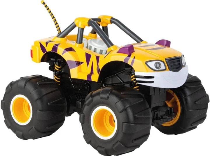 Carrera Blaze and the Monster Machines radio-controlled toy car with vibrant orange and blue design, remote control in hand.