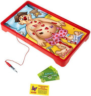Hasbro Classic Operation game with a wooden game board, metal tools, and colorful patient parts on a white background.