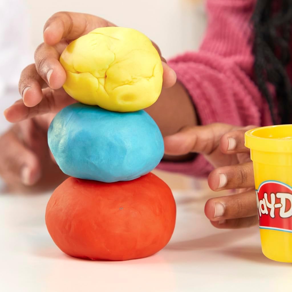 Play-Doh Neon Blue single can of dough, 113g by Hasbro, shown in a colorful container with bright blue modeling clay.