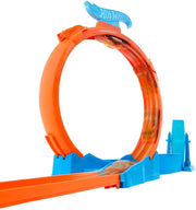 Hot Wheels toy car track set with triple loops and a 1:64 scale vehicle on a colorful track layout.