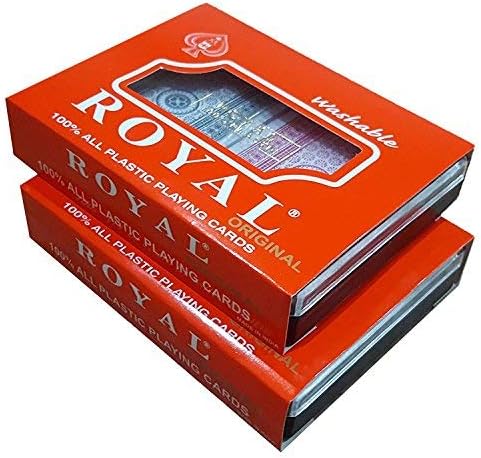 Generic Royal plastic playing cards spread out on a surface, showcasing colorful suits and face cards for card games and magic tricks.