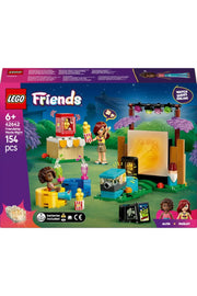 LEGO 42642 Friendship Movie Night set featuring LEGO minifigures and detailed movie-themed accessories on a colorful background.