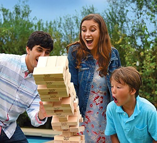 Playzokids Jenga Giant family hardwood stacking game with large wooden blocks arranged for play on a table.