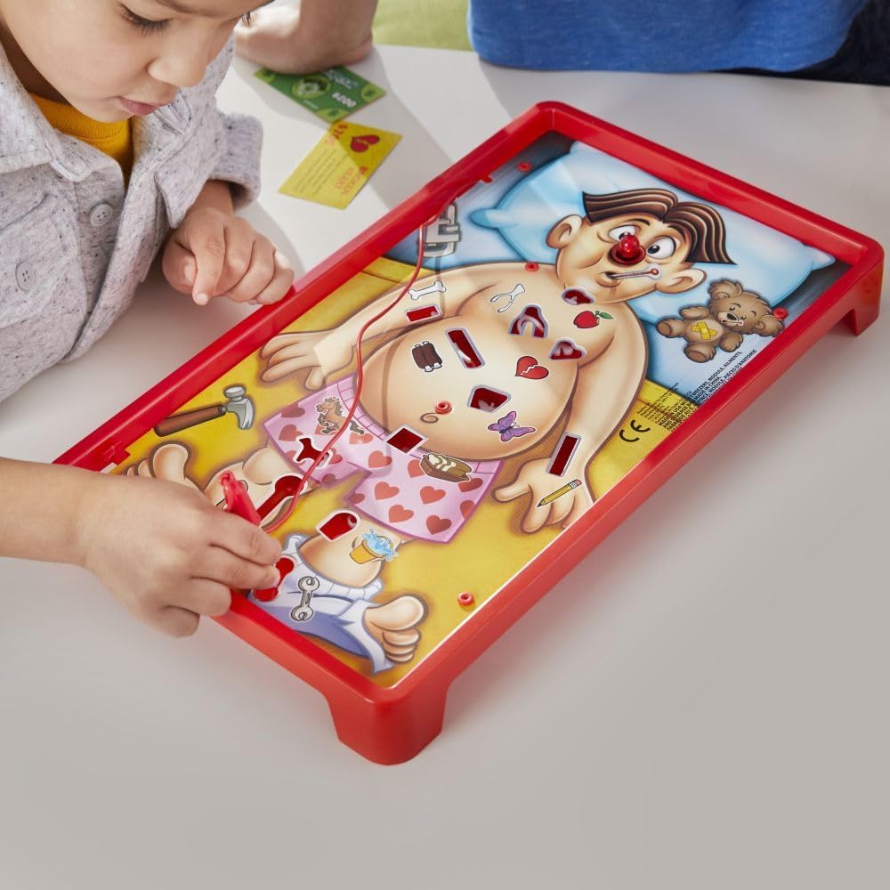 Hasbro Classic Operation game with a wooden game board, metal tools, and colorful patient parts on a white background.