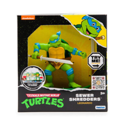 Teenage Mutant Ninja Turtles Sewer Shredders toy featuring Leonardo with his blue mask and ninja weapons from Funrise.