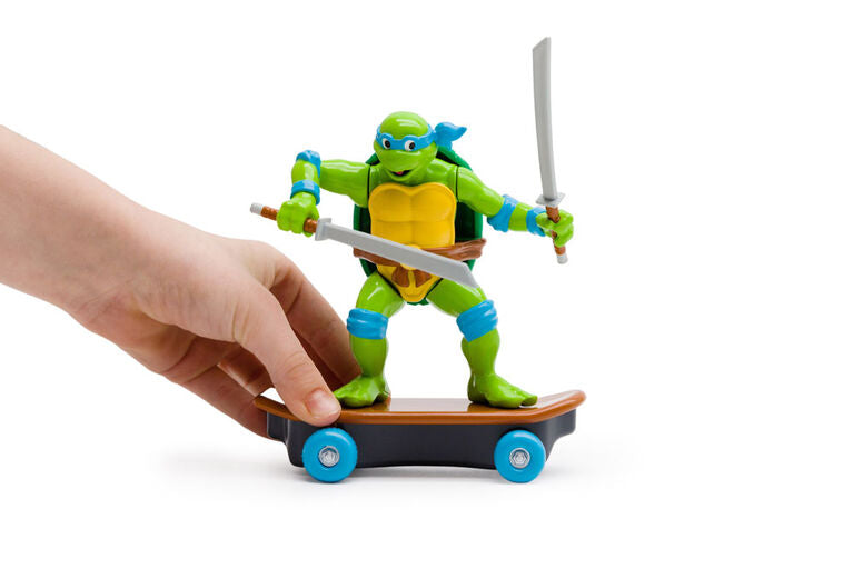 Teenage Mutant Ninja Turtles Sewer Shredders Leonardo toy by Funrise, featuring Leonardo in ninja gear with weapons.