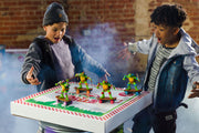 Teenage Mutant Ninja Turtles Sewer Shredders toy featuring Leonardo with his blue mask and ninja weapons from Funrise.