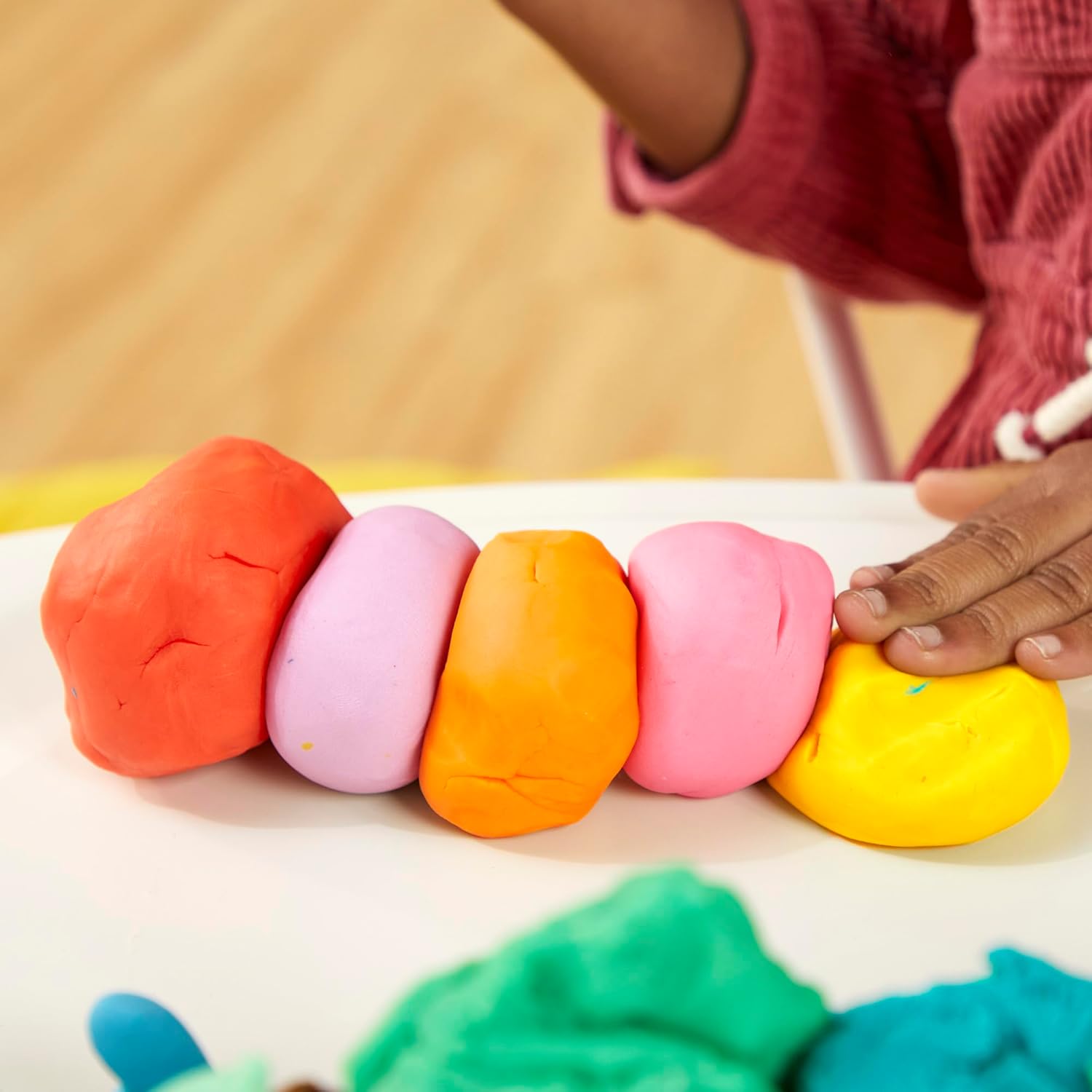 Set of 15 mini Play-Doh cans in colorful packaging, ideal for kids' party favors, by Hasbro Play-Doh Toys.