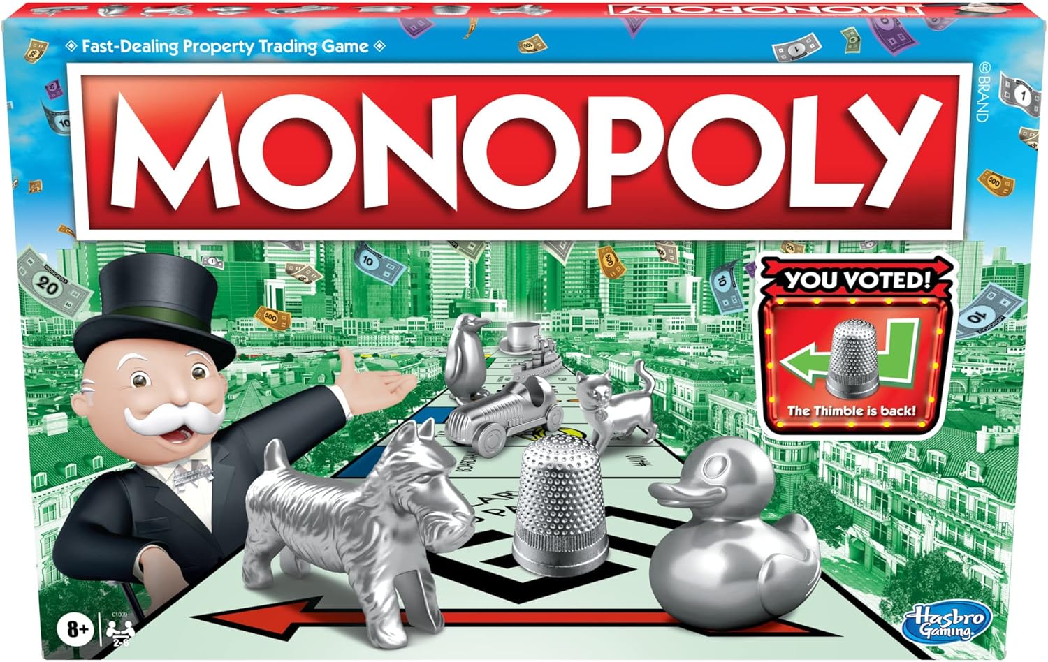 Hasbro Monopoly family board game with colorful game board, tokens, and property cards for family fun and strategic play