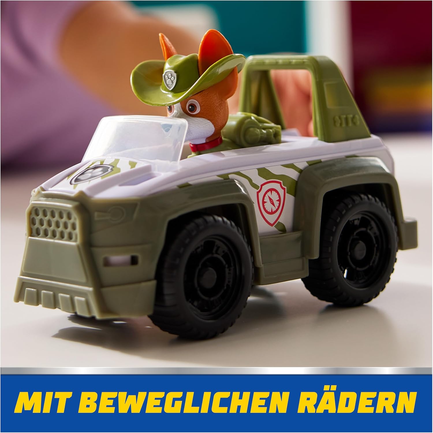 Spin Master PAW Patrol Jungle Jeep toy with Tracker figure, featuring colorful jungle-themed design and detailed vehicle and character.