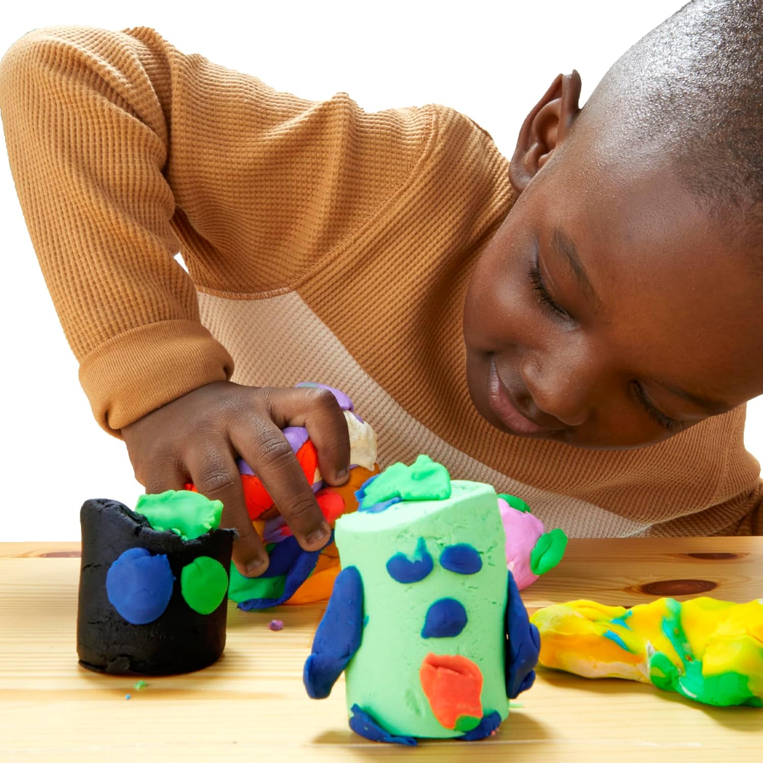 Colorful Play-Doh Party Bag with 15 mini cans of toy modeling clay for kids' party favors by Hasbro.