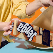 Official Hasbro Jenga game with wooden blocks stacked in a tower for classic skill and balance gameplay.