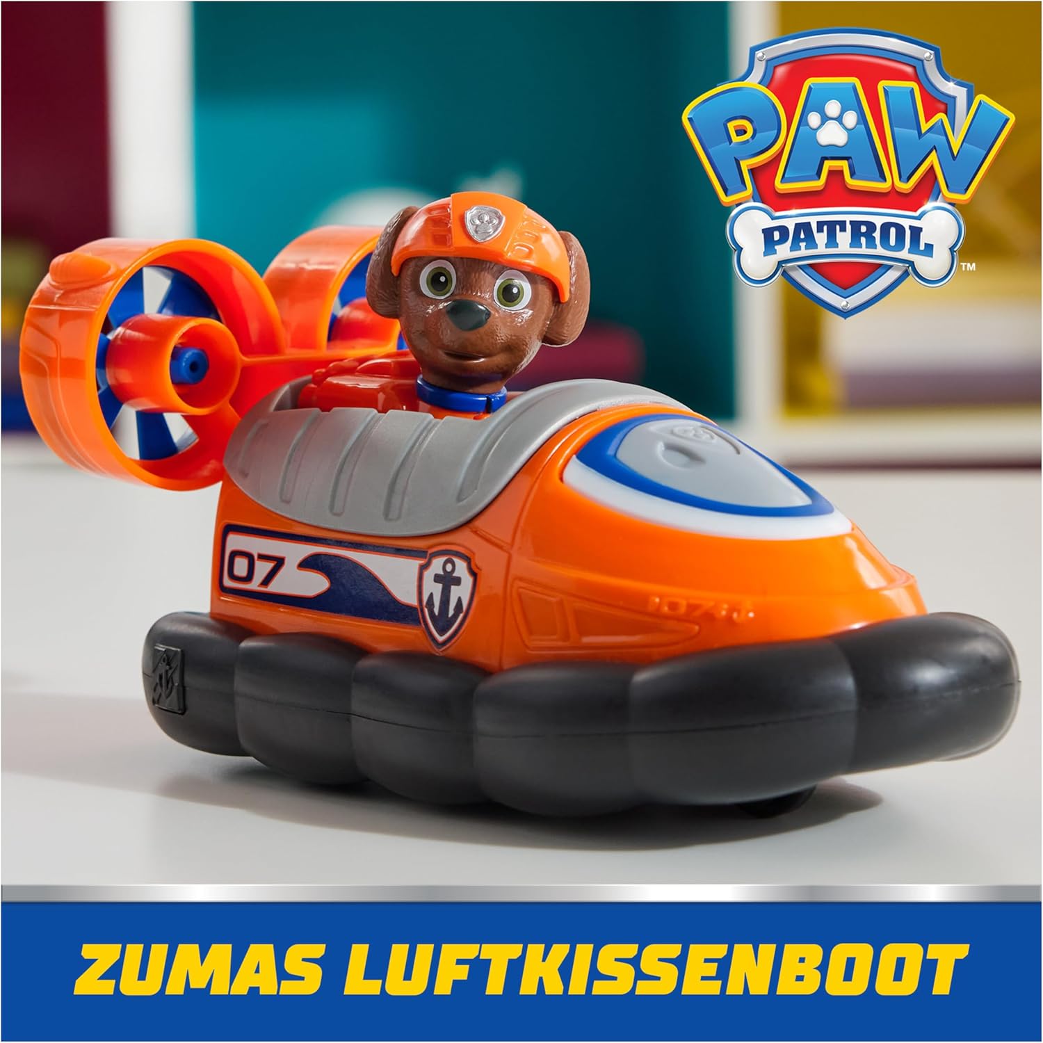 Spin Master PAW Patrol Air Cushion Boat toy featuring Zuma dog figure, colorful inflatable boat with detailed character design.