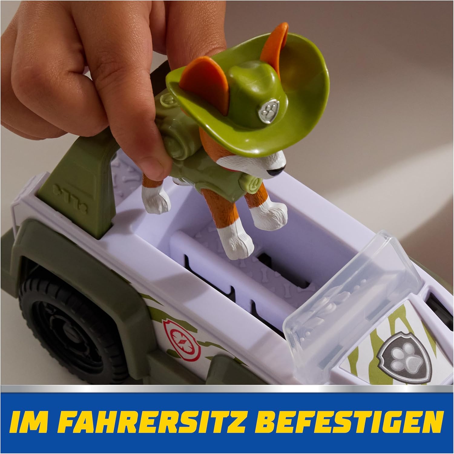 Spin Master PAW Patrol Jungle Jeep toy with Tracker figure, detailed rescue vehicle and character from the popular children's playset.