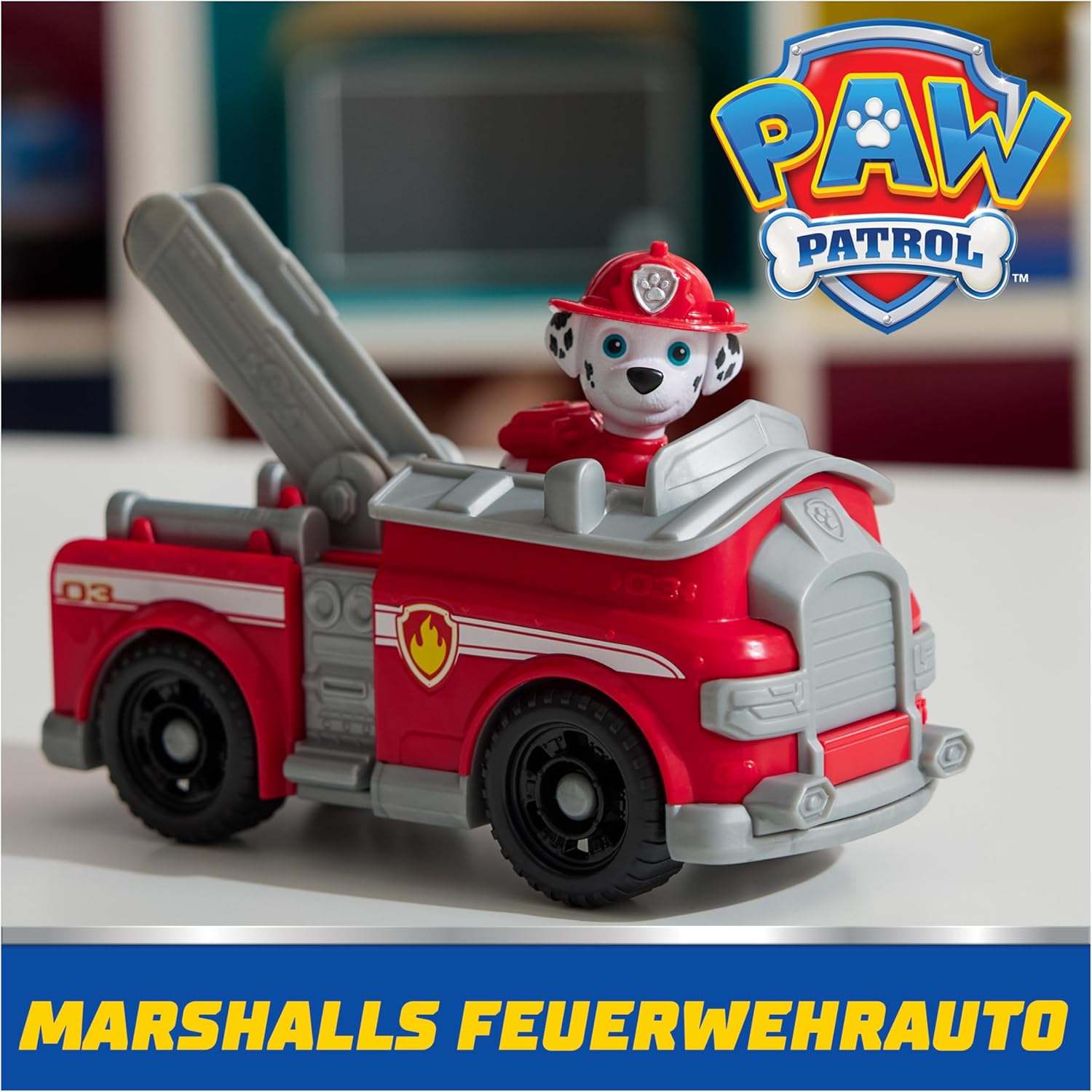Paw Patrol Marshall fire truck toy set with Marshall figure from Spin Master, featuring a colorful rescue vehicle and character.
