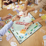 Hasbro Monopoly family board game with colorful game board, tokens, and property cards for fun family gaming sessions.