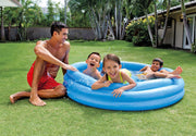 Playzokids Intex Recreation Crystal Blue Pool filled with water and set up outdoors, showcasing a large inflatable swimming pool.