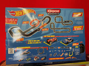 Carrera GO!!! Hot Wheels™ 6.4 race track set with colorful track pieces and racing cars on a smooth track layout.