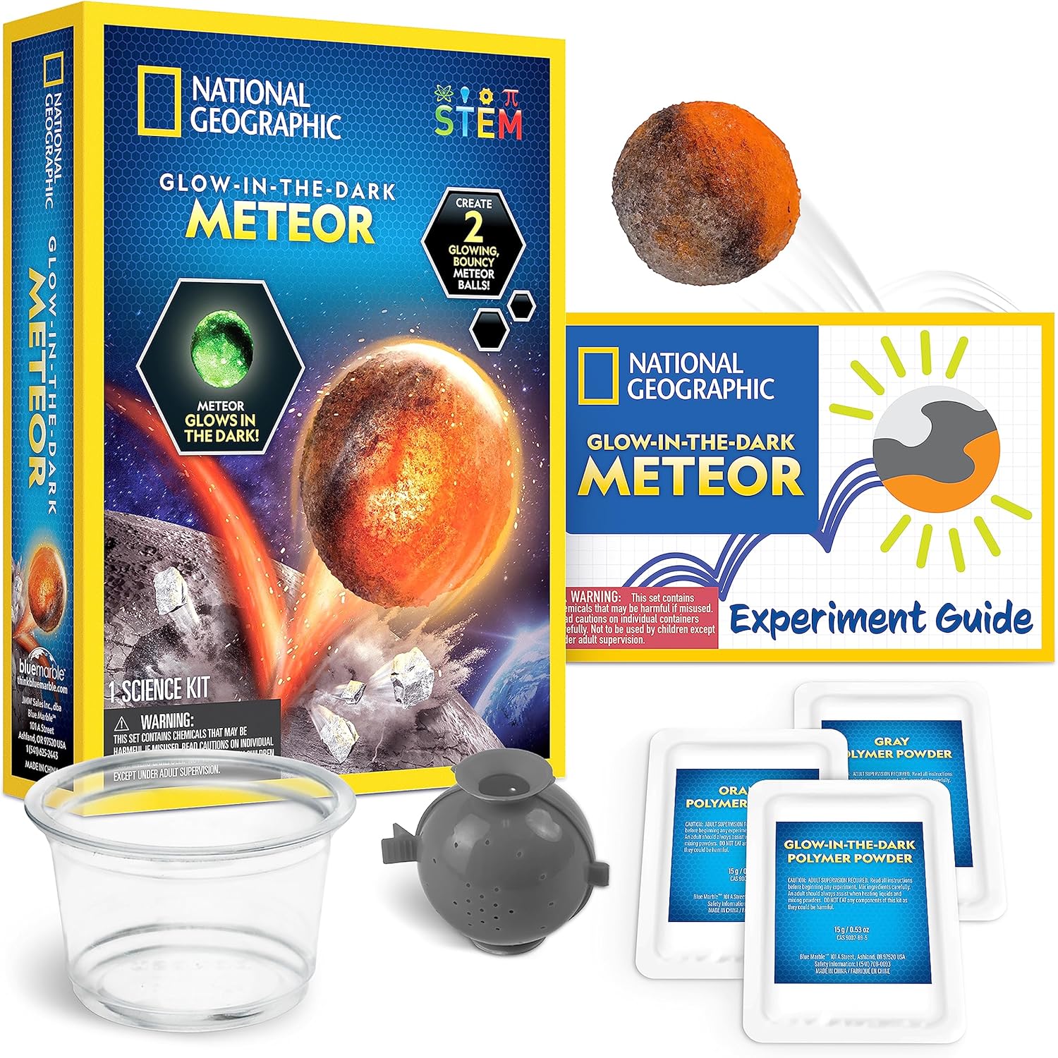 Glow-in-the-dark meteor toy from National Geographic by Playzokids, featuring detailed celestial design on a dark background.