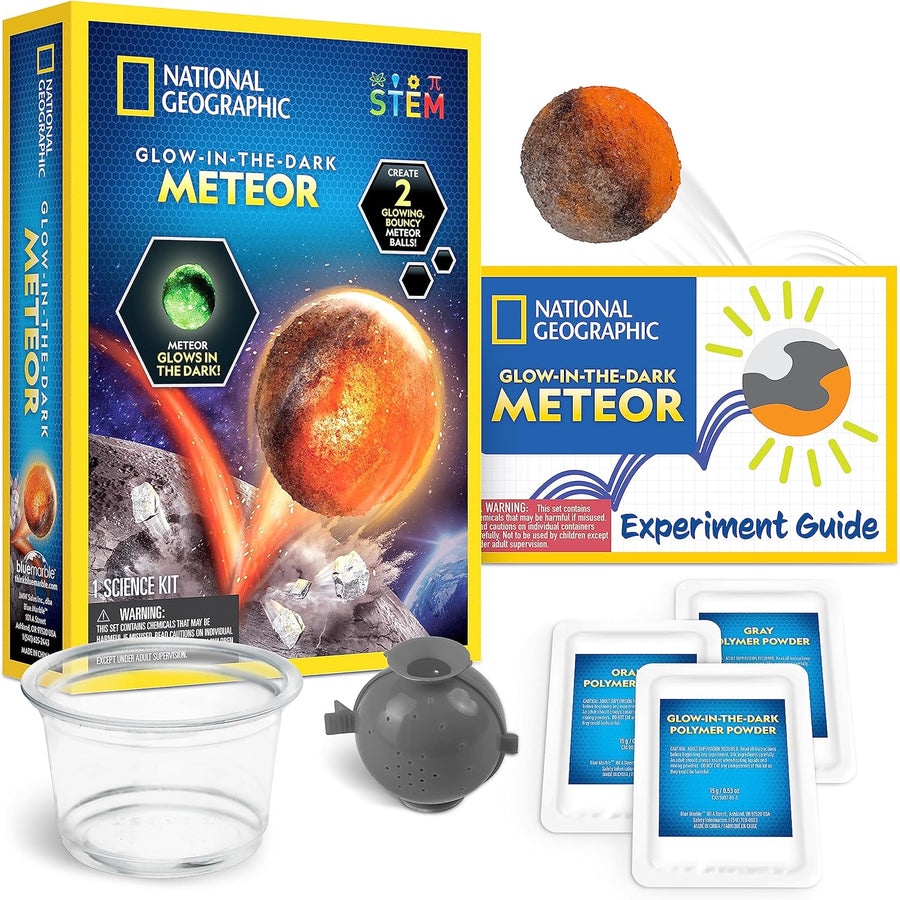 Glow-in-the-dark meteor toy from National Geographic by Playzokids, featuring detailed celestial design on a dark background.
