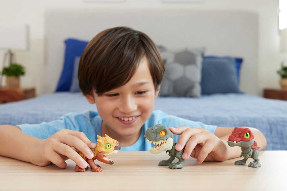 Jurassic World Mighty Biters Spinosaurus toy figure with detailed features and realistic design, suitable for dinosaur fans.