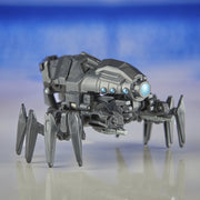 Hasbro Transformers COG Changer Arachnid action figure with detailed insect-like design and multiple articulation points.