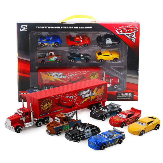 Seven-piece McQueen Disney Pixar Cars 3 toy set featuring colorful die-cast cars and accessories on a display background.