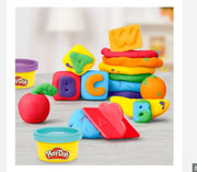 Hasbro Play-Doh Fundamentals ABC Tool Set with six colorful, non-toxic dough tools and bright Play-Doh colors for creative fun.