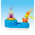 Colorful Tanny Toys Playtime Pounding Stacker for kids, featuring stacking rings and a pounding hammer in a bright, playful design.