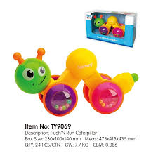 Tanny Toys Push'N Run Caterpillar toy with colorful legs and a smiling face, designed for young children to push and run.