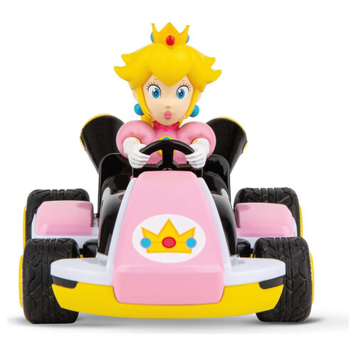 Carrera Mario Kart Peach radio control toy car with vibrant orange and pink colors, detailed Peach character design, on a smooth surface.