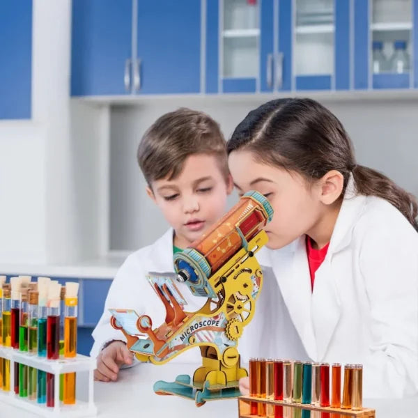 National Geographic DIY STEM Microscope Kit toy with assembled microscope and accessories for educational science exploration.