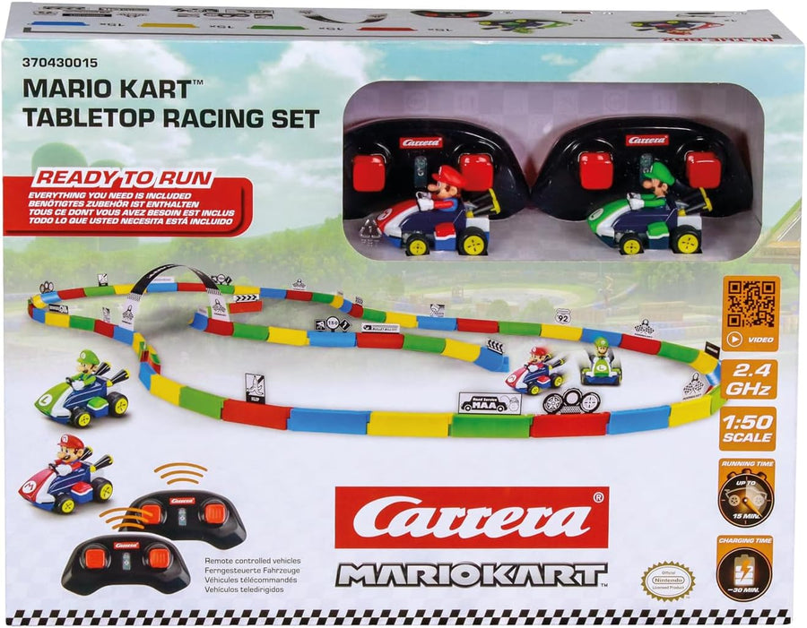 Carrera RC Mario Kart tabletop racing set with Mario and Luigi figures, featuring colorful race tracks and miniature cars.