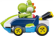 Carrera Mario Kart(TM) Yoshi mini remote control toy on a colorful play surface.